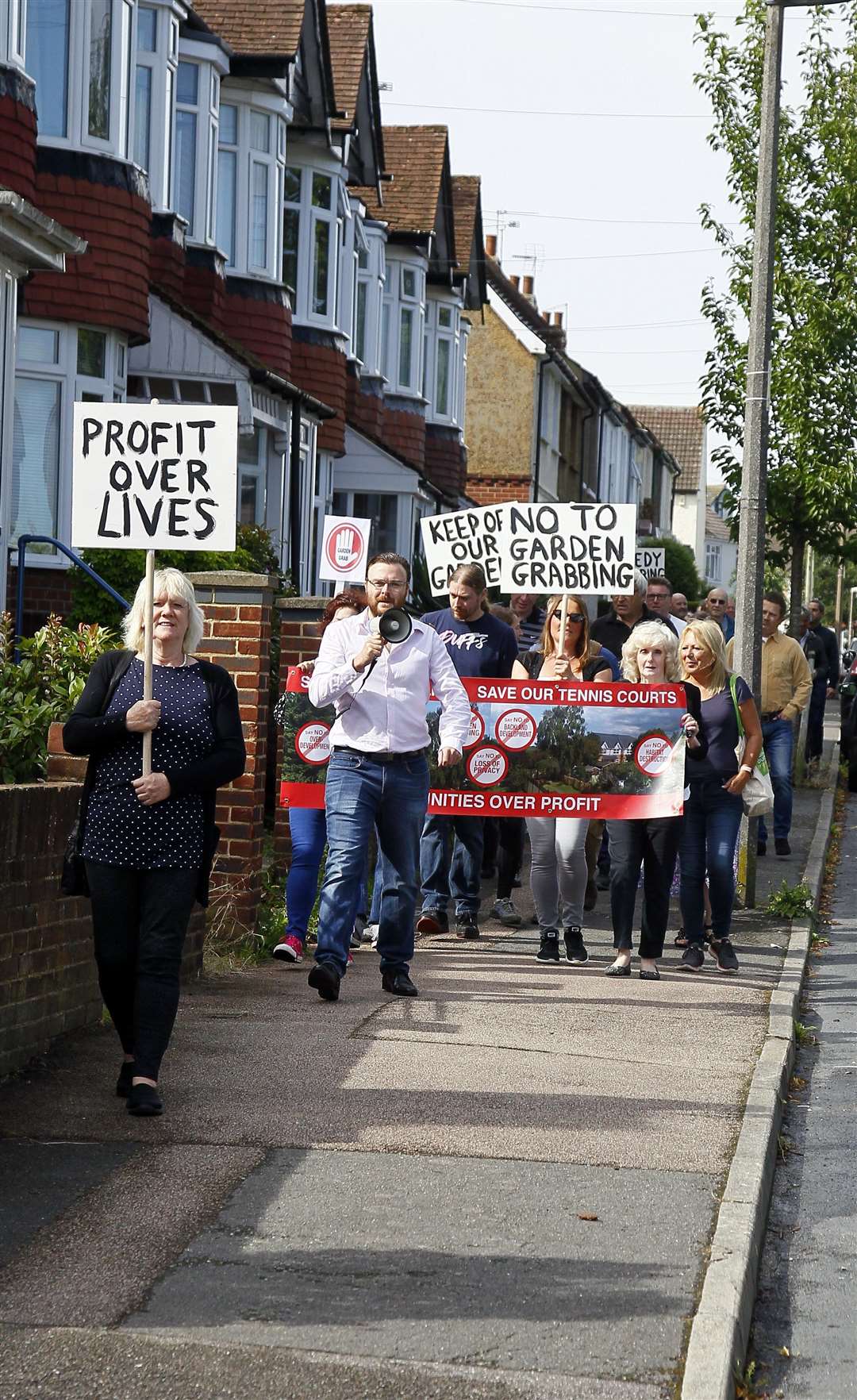 People held banners a posters as they marched down Glebe Road, Gillingham .Picture: Sean Aidan (15372477)