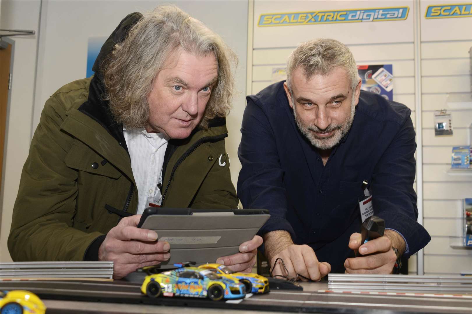 The Grand Tour's James May popped in to see what was new and ended up playing the latest digital Scalextric Spark Plug. Pictures: Paul Amos