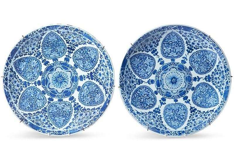 A pair of stunning blue and white Chinese dishes from the Kangxi period which carry an estimate of £7,000-£9,000