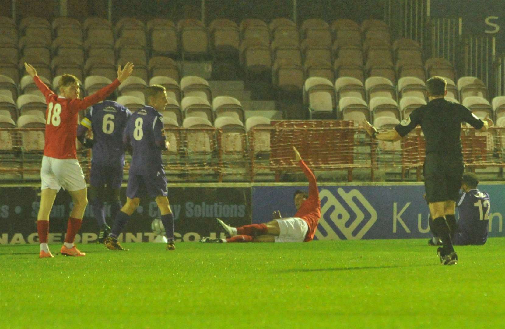 Ebbsfleet penalty appeals after Noah Chesmain challenges Adam Mekki Picture: Steve Terrell