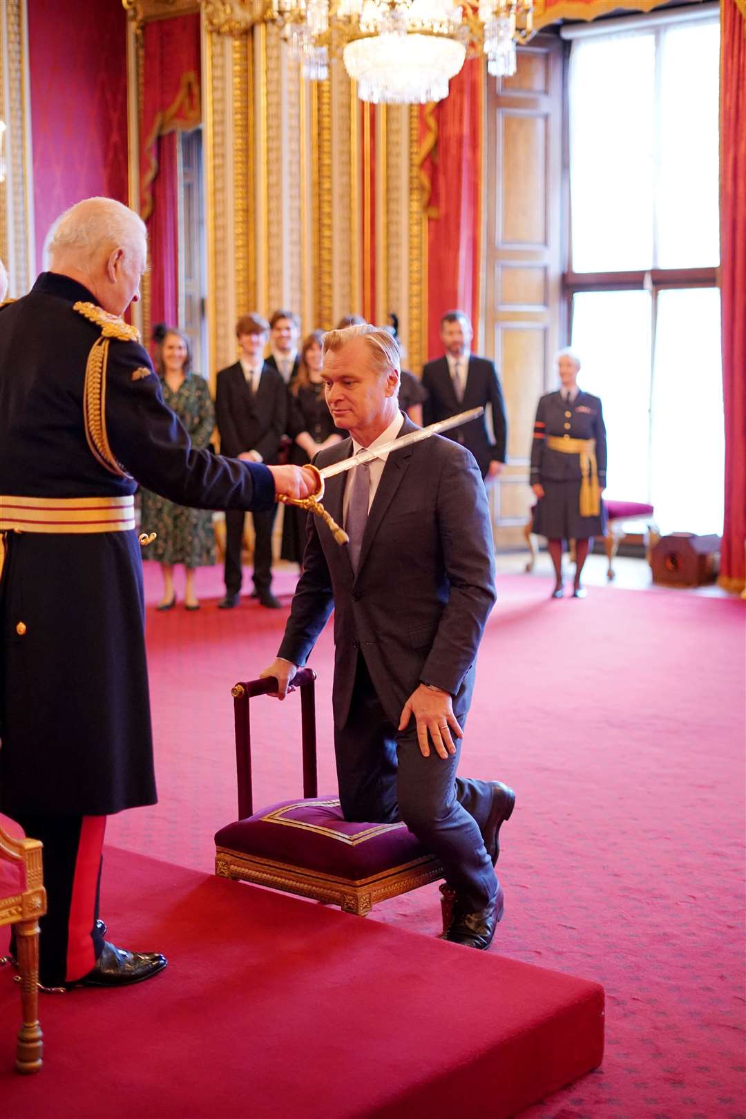 Christopher Nolan is made a Knight Bachelor by the King (Jordan Pettitt/PA)