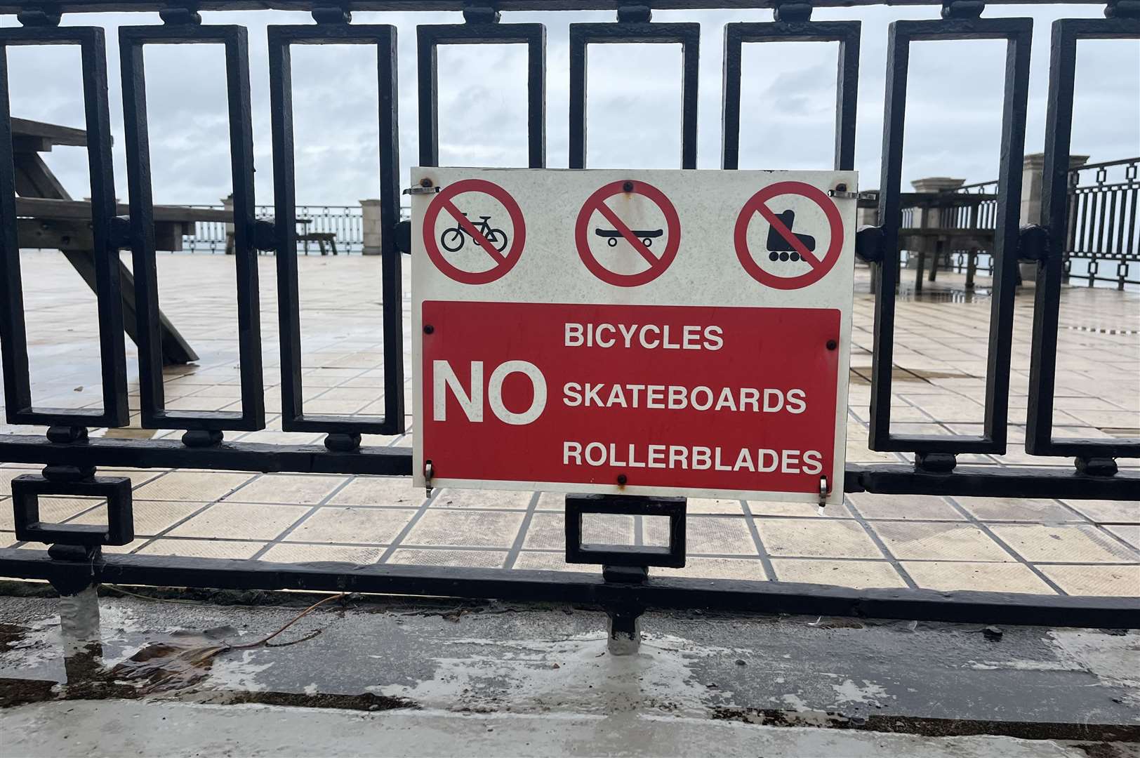 Signs outside The Leas Cliff Hall, Folkestone, say bikes, skateboards and rollerblades are banned but there’s no mention of scooters