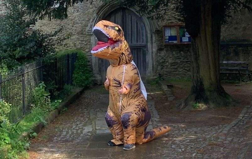 Ollie Rutt from East Malling dressed in his dinosaur costume