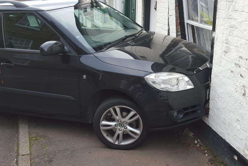 The car caused severe damage to the cottage