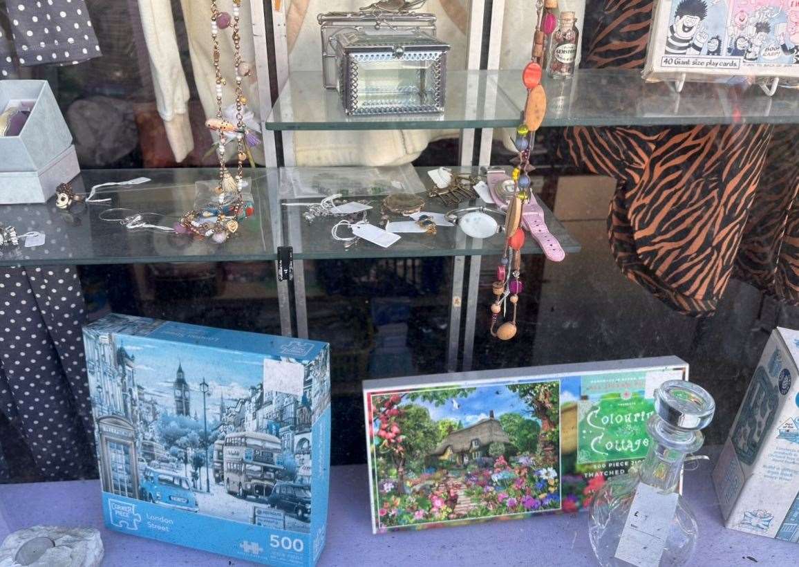 Some of the window display donations include jewellery and puzzlesSave the Children in Union Street, Maidstone,