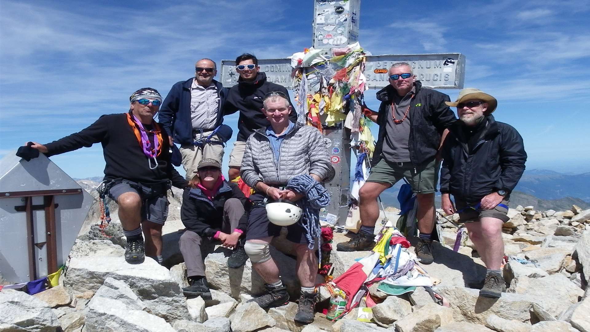 Jim Kerr (left) and the team at the summit of Aneto