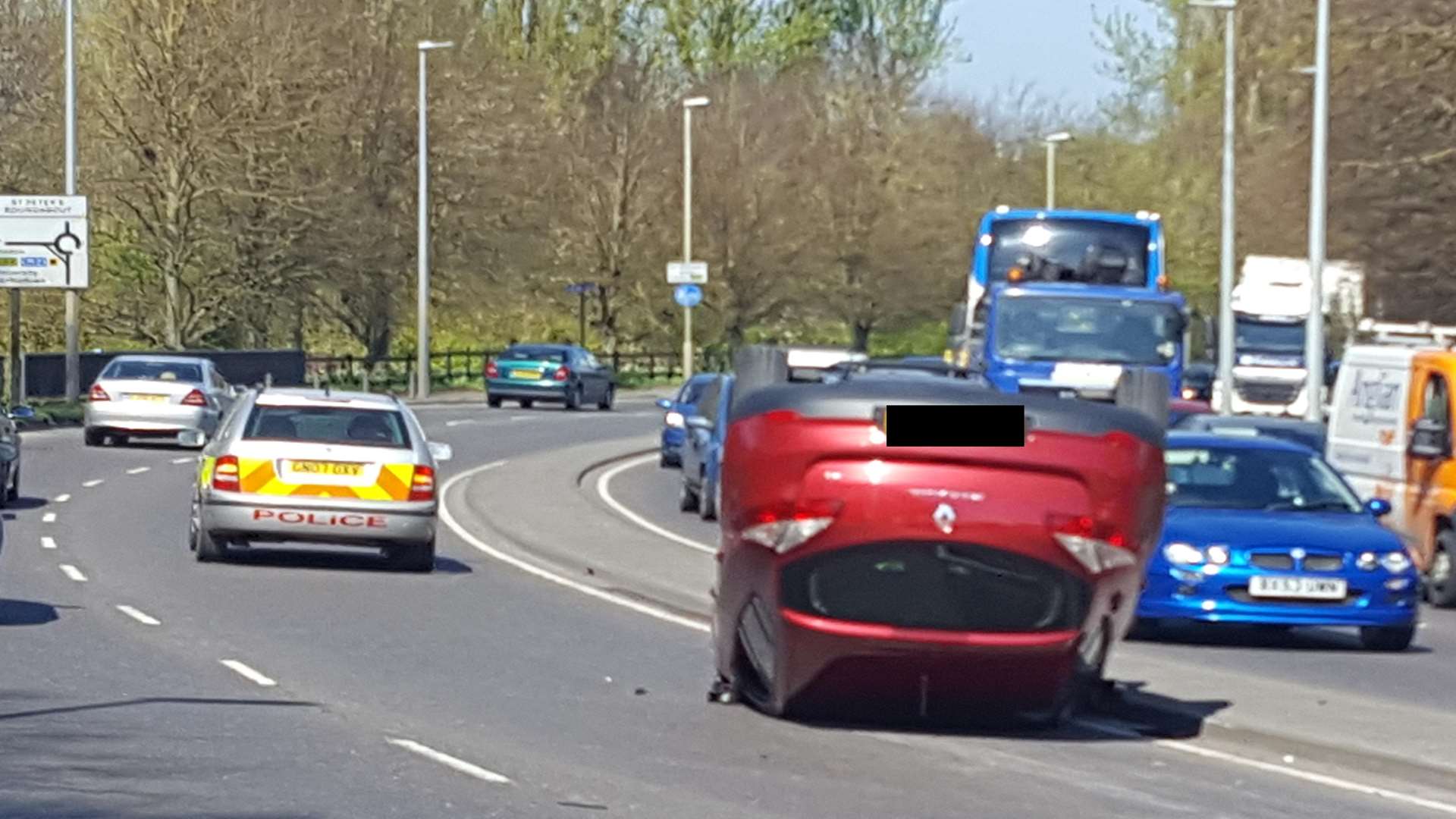 A car has overturned on the Rheims Way, Canterbury.