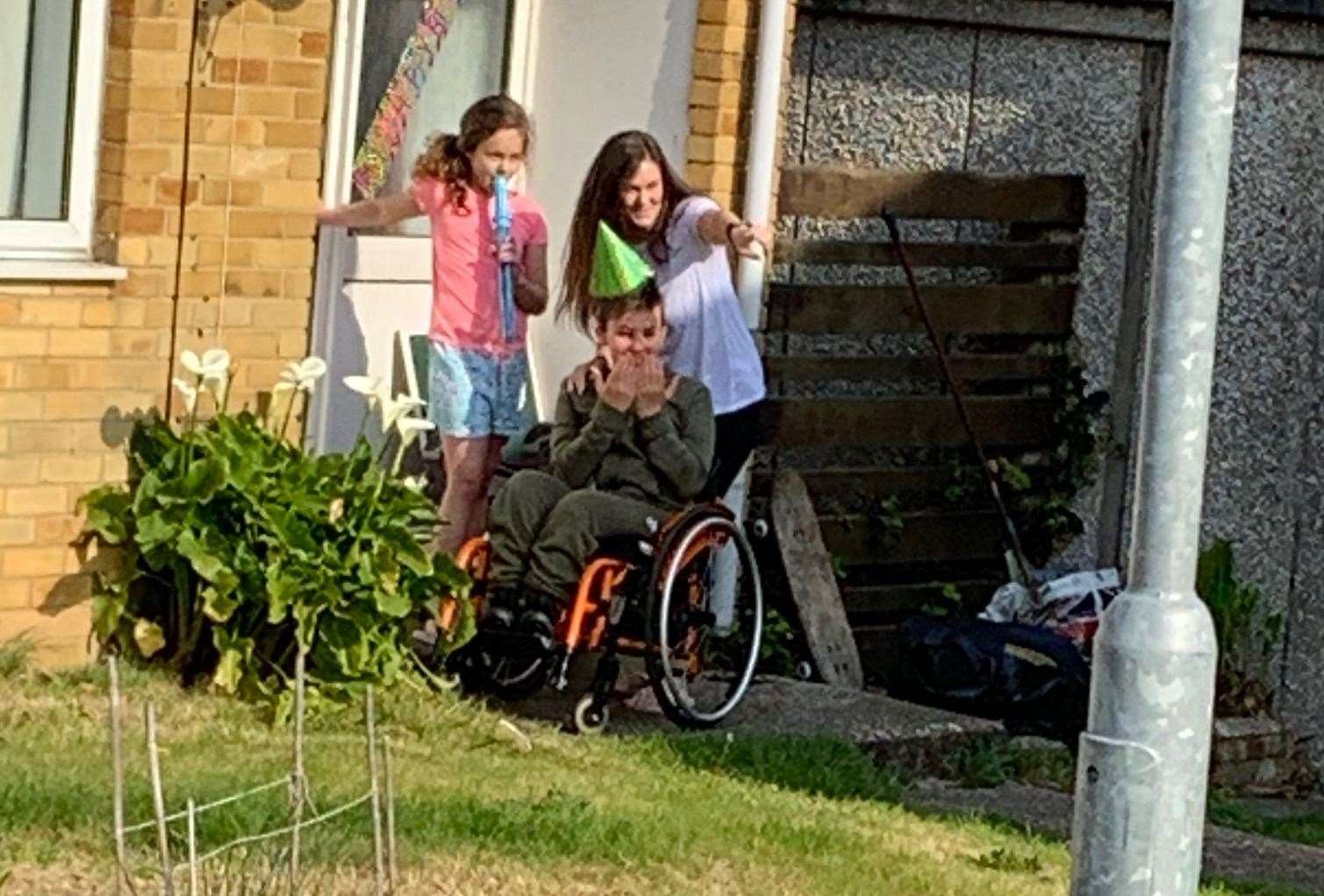 Alex Moss opened his front door to find officers greeting him happy birthday