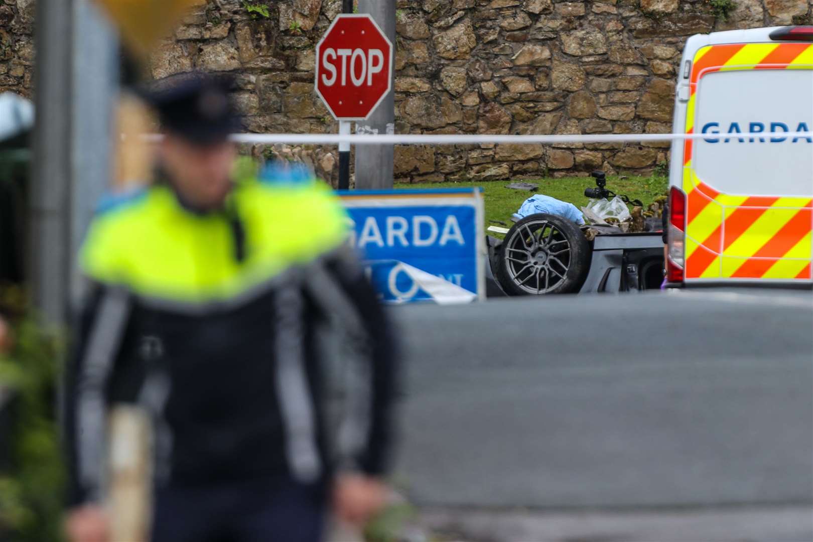 Forensic collision investigators examine the scene of the crash in Clonmel (Damien Storan/PA)