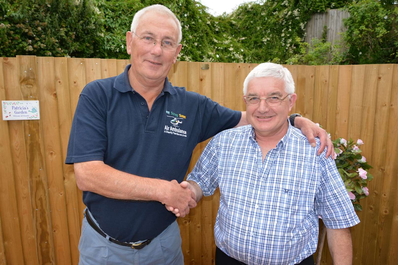 Air ambulance's Mike Stevens with winner Ray Spicer