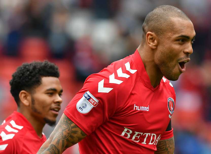 Josh Magennis wheels away after putting Charlton ahead. Picture: Keith Gillard