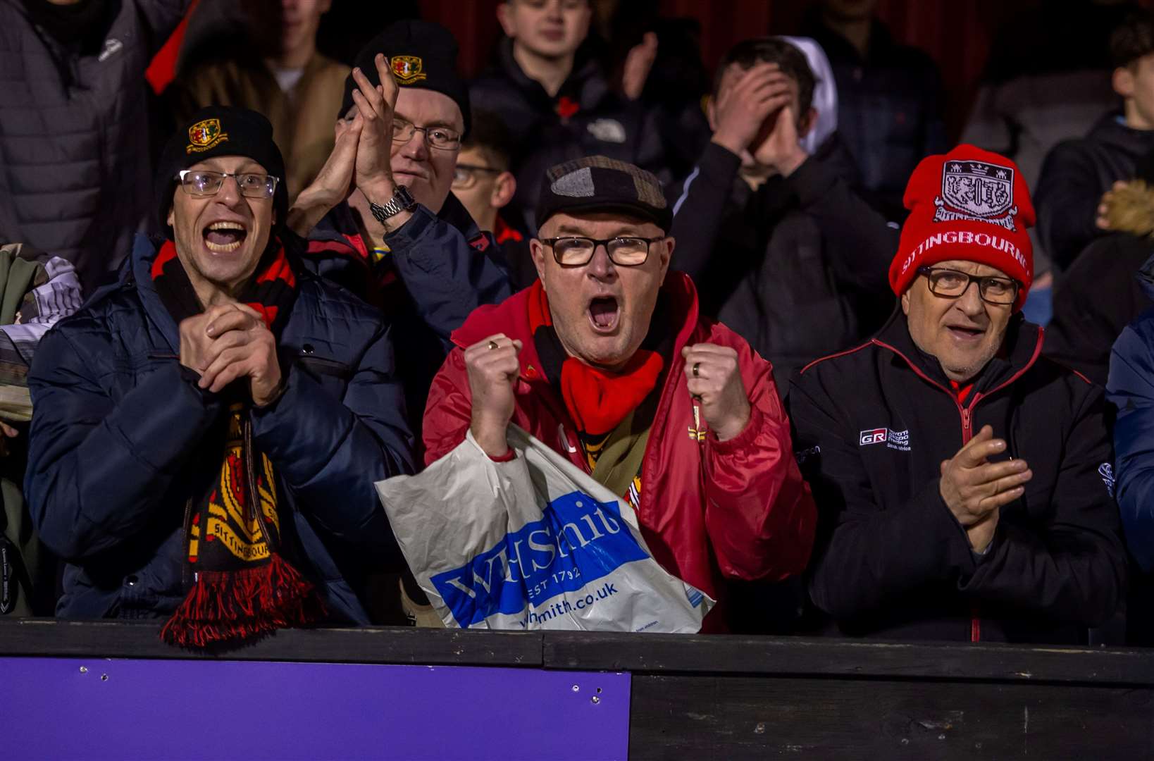 Brickies fans enjoy the moment after seeing their team beat Salisbury in the FA Trophy. Picture: Ian Scammell