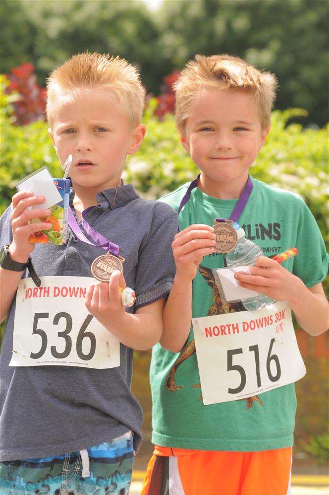 Under 8 boys' race winner Joe Baker (pictured right) and runner-up Archie Aldous.