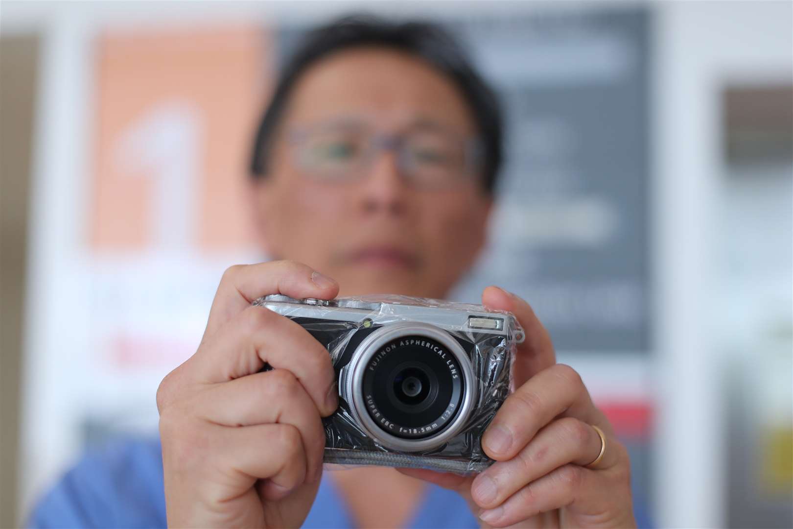 Dr Goh’s pocket-sized camera wrapped in cling film (Niall Carson/PA)