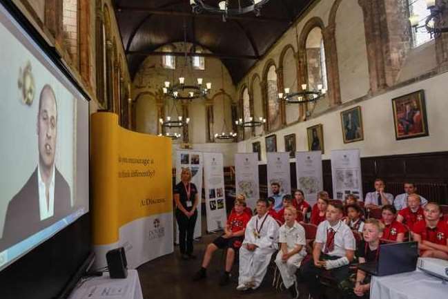 Dover College pupils view the video message by Prince William