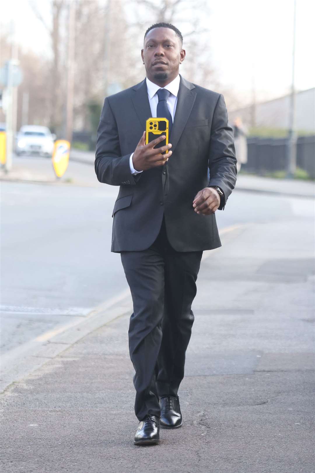 Dizzee Rascal, real name Dylan Mills, arrives at Wimbledon Magistrates’ Court, where he is on trial for allegedly assaulting his ex-girlfriend, Cassandra Jones (James Manning/PA)