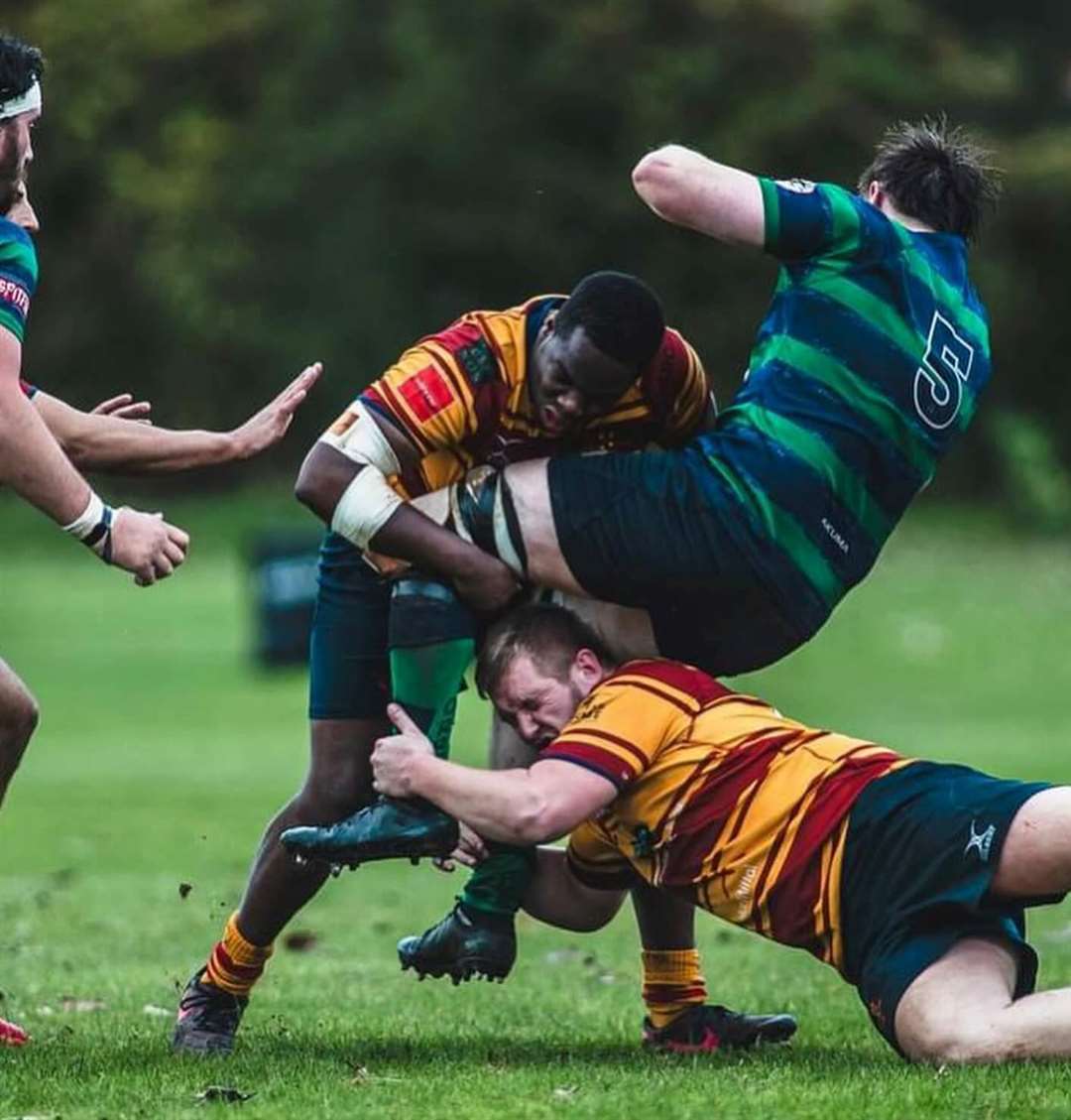 Deji Oyesola and Jack Nickalls team up to thwart Old Reigatian. Picture: Jake Miles Sports Photography