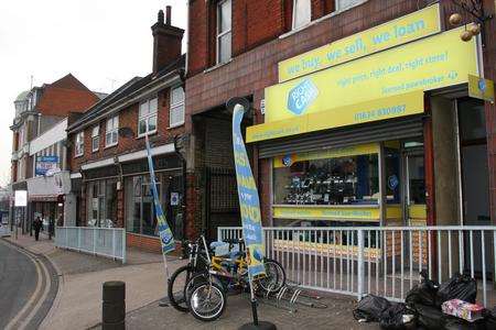 Right Cash in Chatham High Street where an armed robbery has taken place.