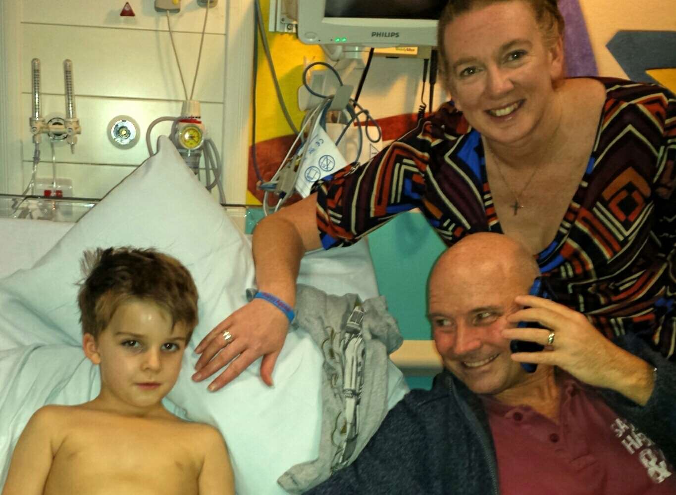 Samuel Bourdillon recovering in hospital with dad Paul and mum Karen