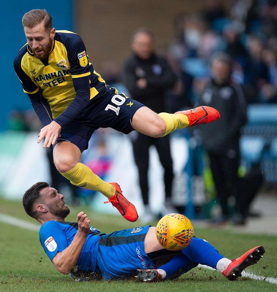 Luke O'Neill wins the ball with a sliding tackle Picture: Ady Kerry (7222092)