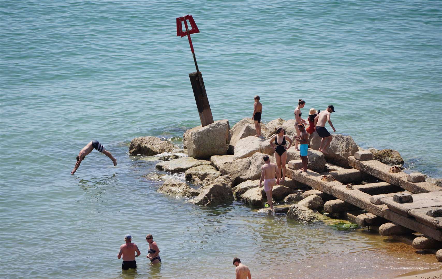 Temperatures are not expected to beat yearly records on Sunday(Ben Birchall/PA)