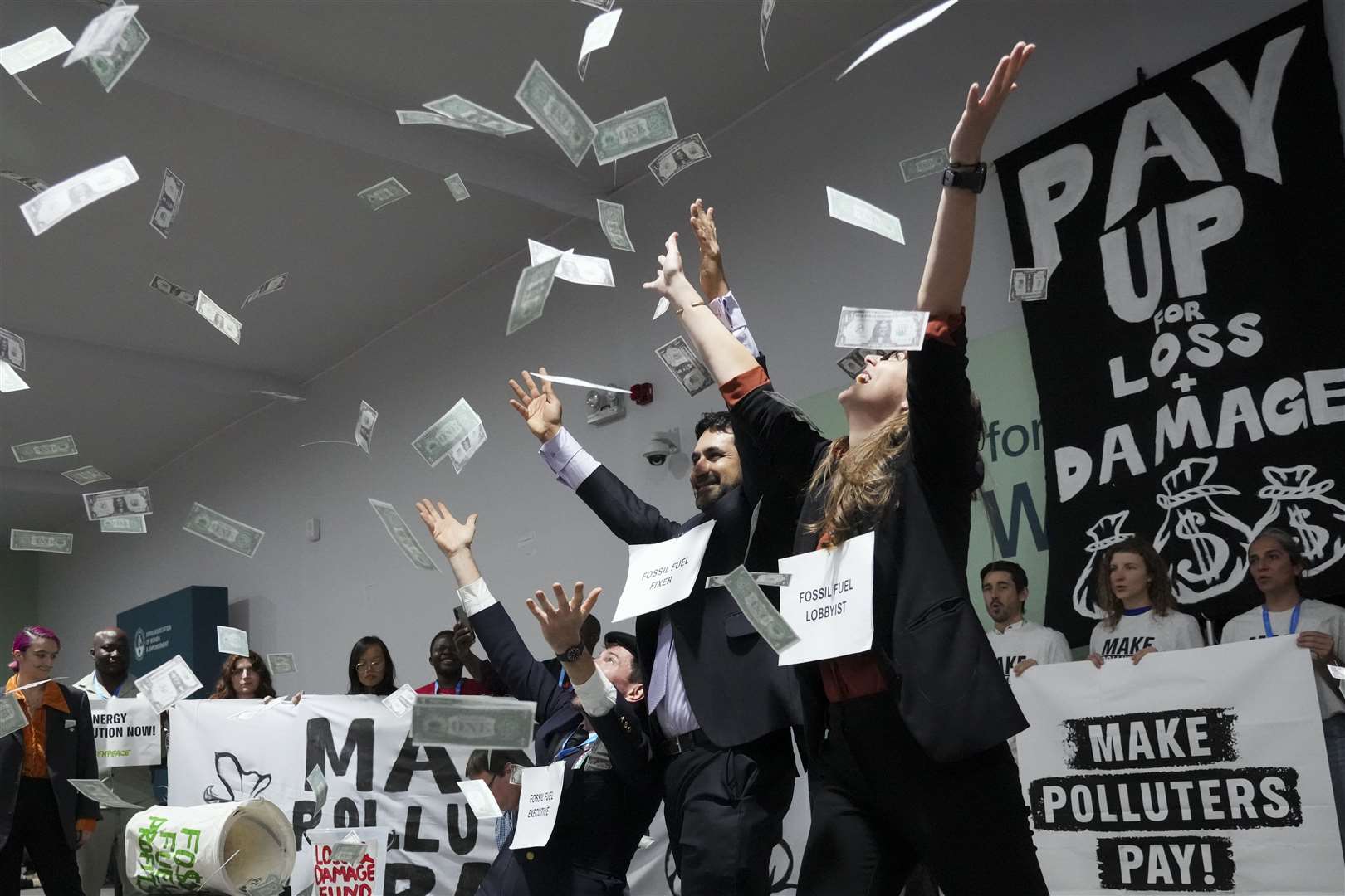 Activists participate in a demonstration for climate finance at the Cop29 UN climate summit (Sergei Grits/AP)