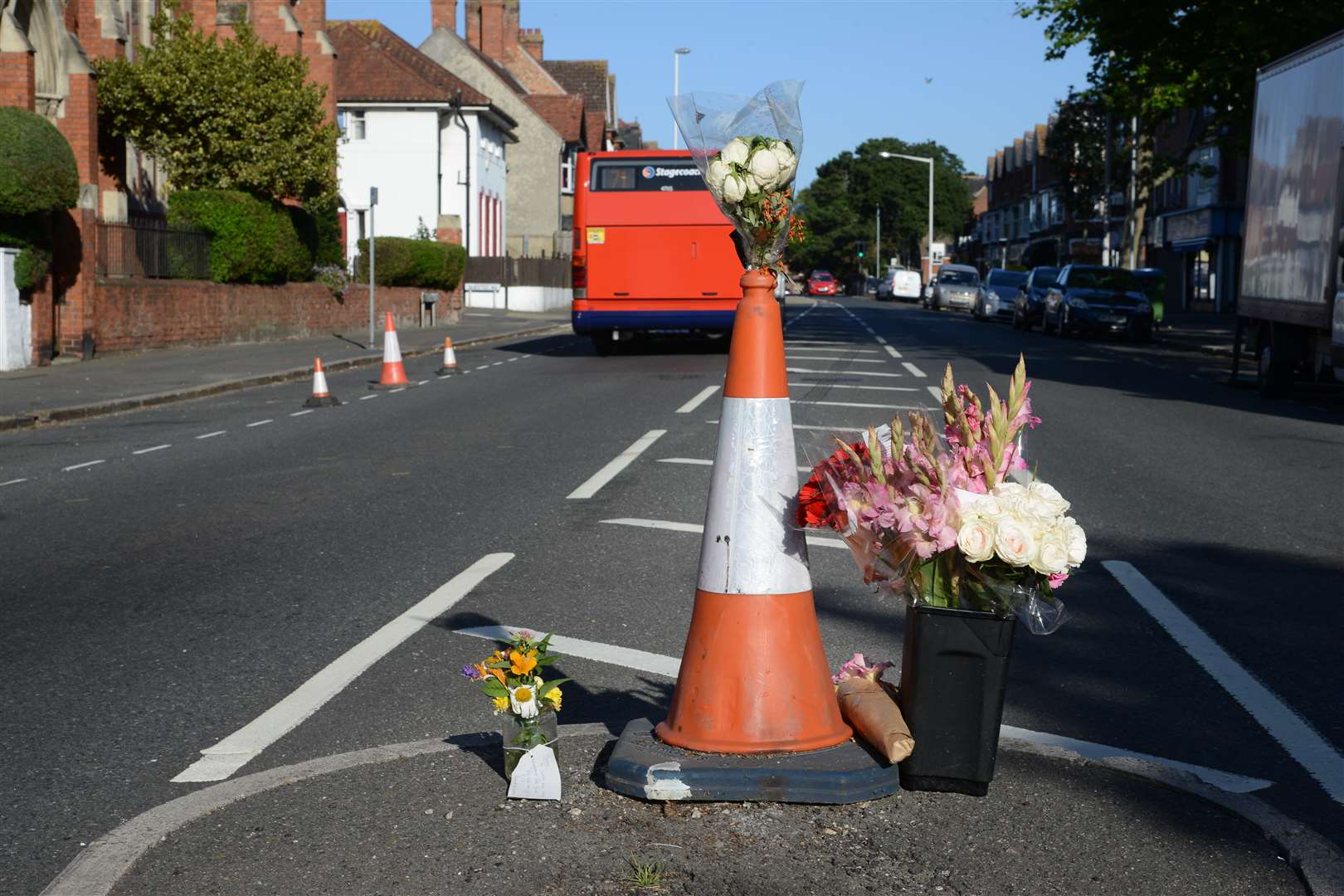 Flowers left in memory of Brian Hawkes