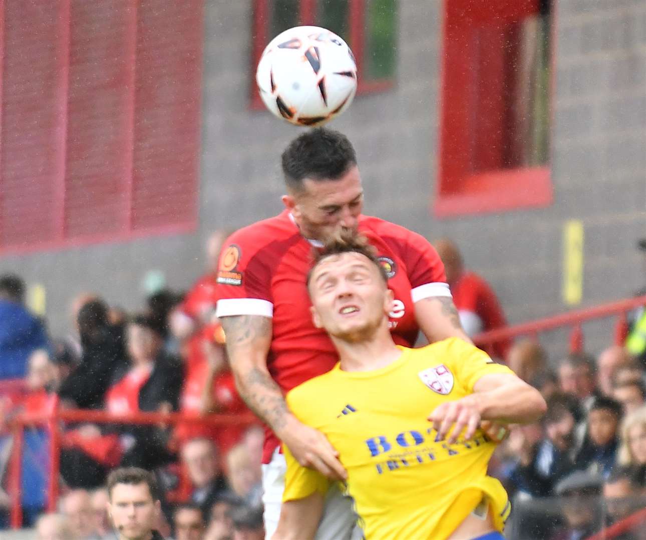 Ebbsfleet defender Lewis Page wins an aerial battle in the first half. Picture: Ed Miller / EUFC