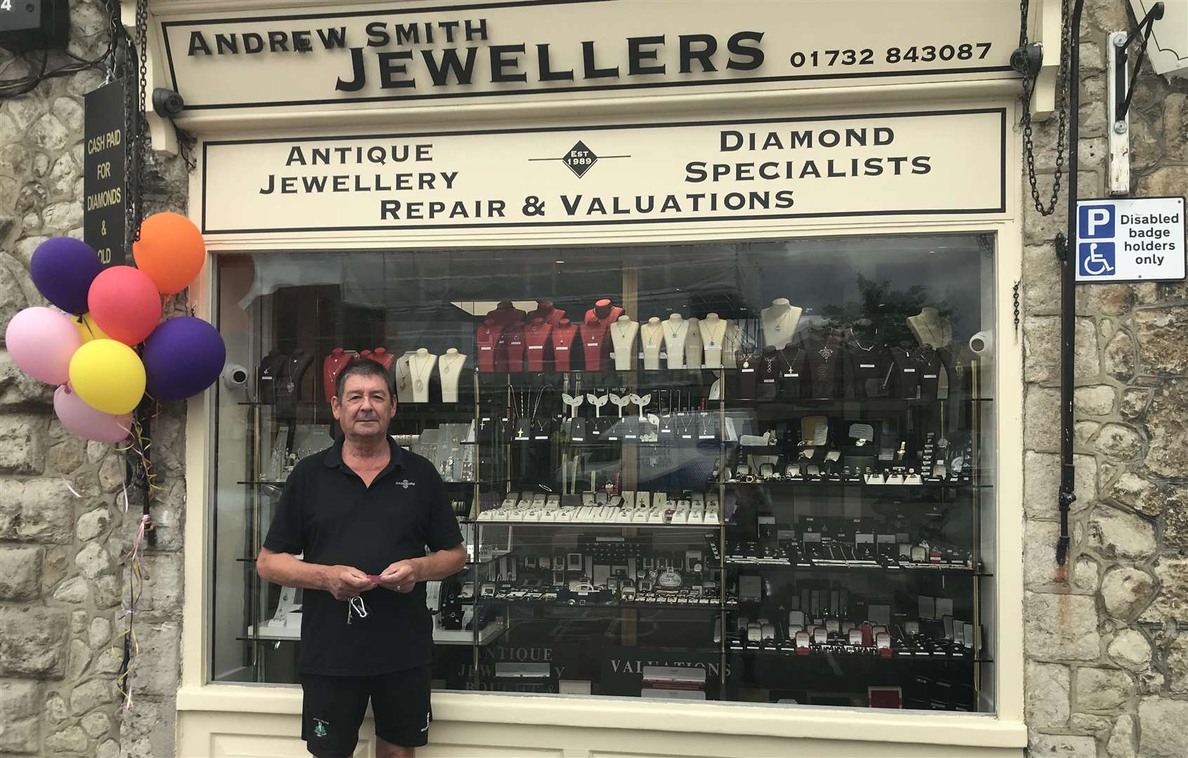 Peter McDermott waiting for a jewellery shop in West Malling to reopen