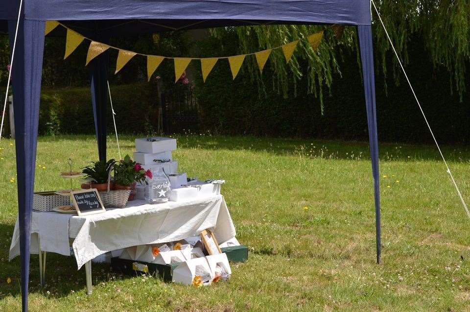 A stall was set up in the centre of Warehorne for people to get their cream tea packages. Picture: Jessie Banach