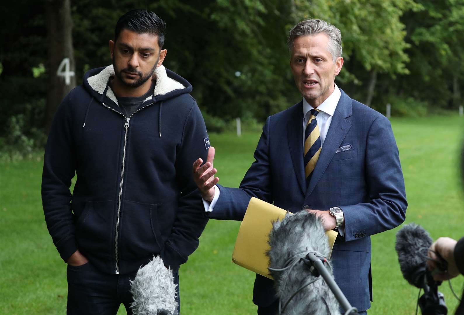 Mr Ahmed spoke alongside Detective Superintendent Martin MacLean (Andrew Milligan/PA)