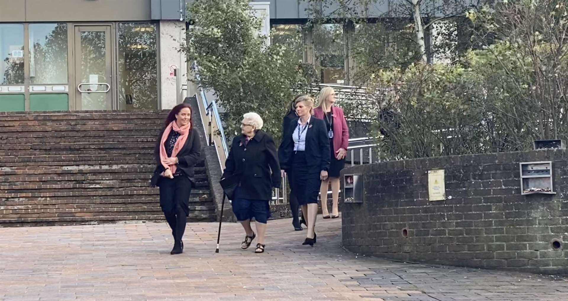 Mum of Wendy Knell, Pam Knell, walking out of Maidstone Crown Court to speak to a group of reporters