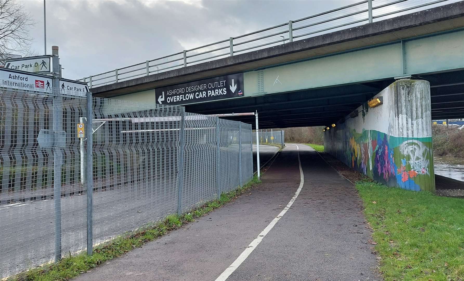 A woman was reportedly attacked in an underpass by Ashford Designer Outlet's overflow car park in January