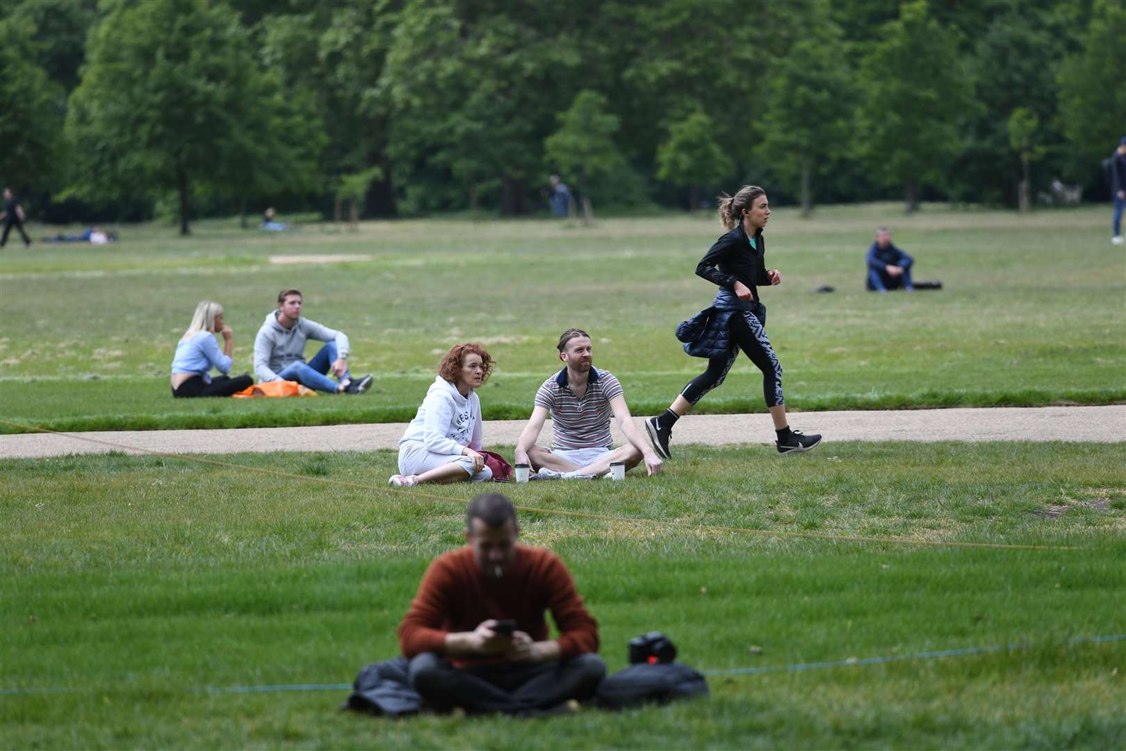 People also visited Hyde Park to exercise and relax, in line with the new rules (Stefan Rousseau/PA)