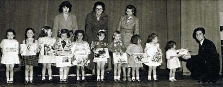 Members of the Keg Megs in the 1940s with Dorothy Hitchens and her brother, John, wearing matching cardigans