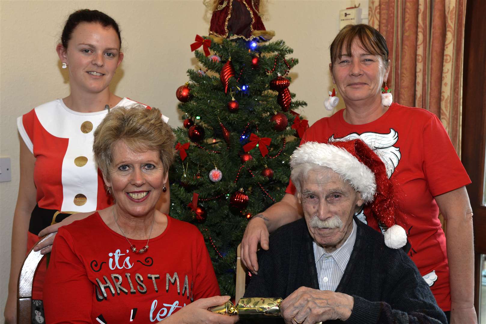 Staff dress in Christmas jumpers and celebrate with the residents. L-R Becky Hazlehurst, Jayne Ashington, Earnest Becket and Lorraine Crone