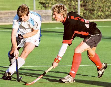 Ashford, black and red, on their way to a first home win of the season against Milton Keynes