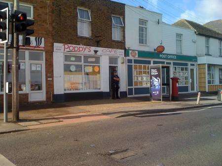 Police outside Poppy's Cafe in Halfway after a robbery