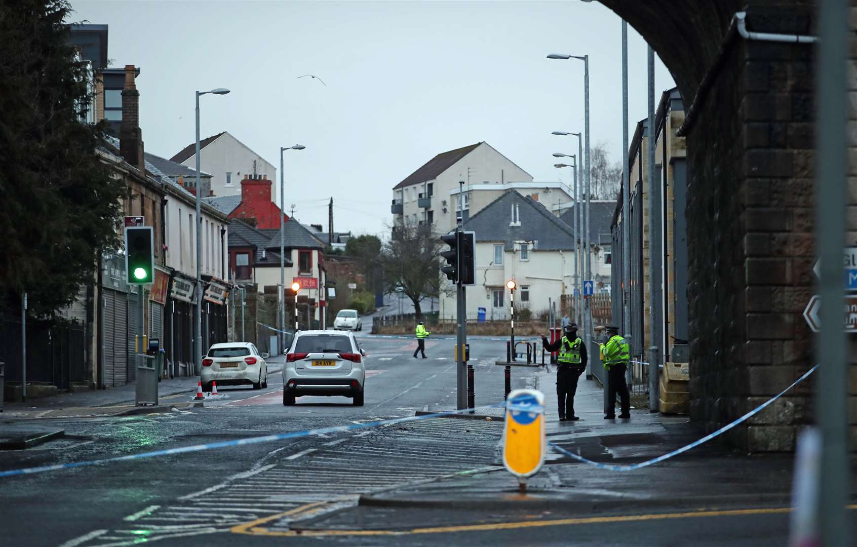 Police at the scene of the incident in Portland Street, Kilmarnock (Jane Barlow/PA)