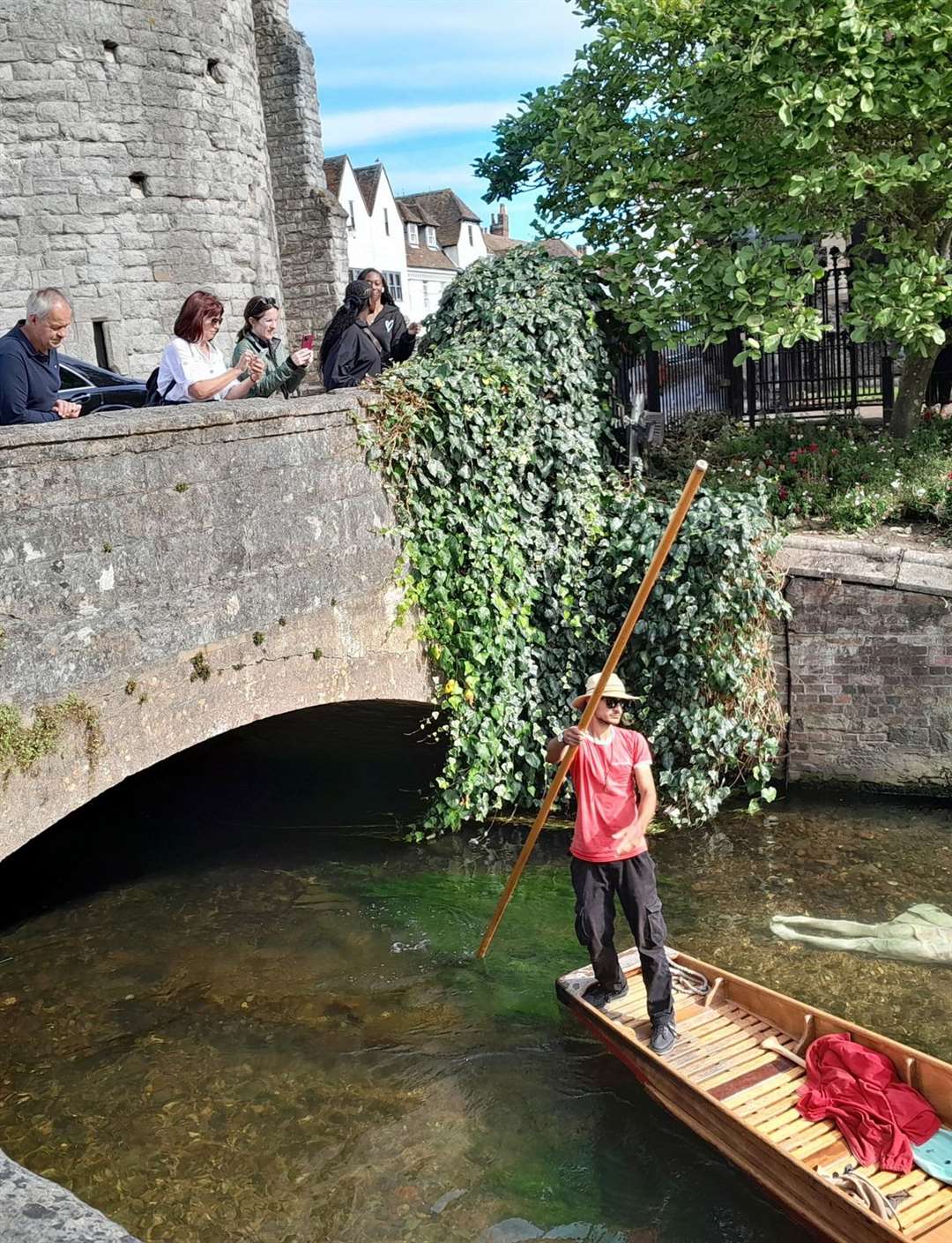 The new Allivia statue in the Stour by the Westgate Towers in Canterbury