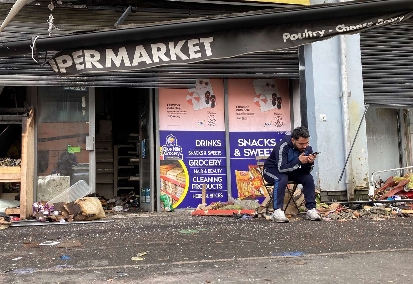 Abdelkader Mohamad Al Alloush, owner of the Sham Supermarket on Donegall Road in Belfast, after it was burned on Saturday night (Rebecca Black/PA)