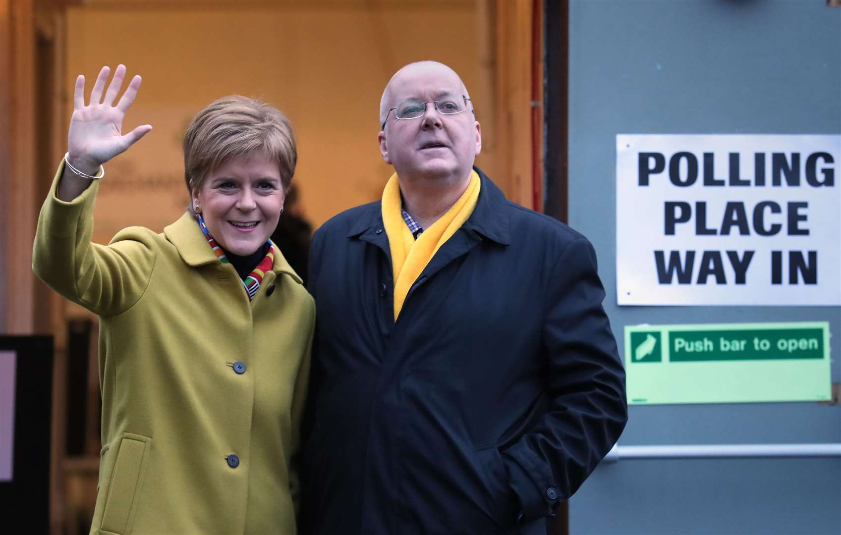 Nicola Sturgeon and Peter Murrell (Andrew Milligan/PA)