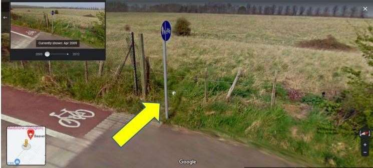 The Google Streetview image from 2009, showing a fence