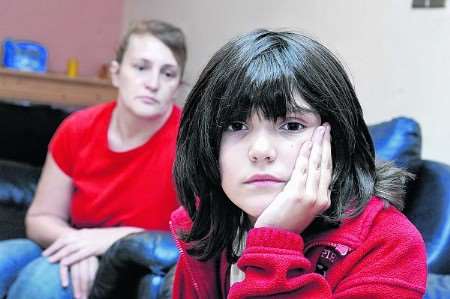 Claire Ratcliff and her daughter Danielle 9 who was refused a school dinner due to a debt of £4.00 to the school. Picture by Matt Reading