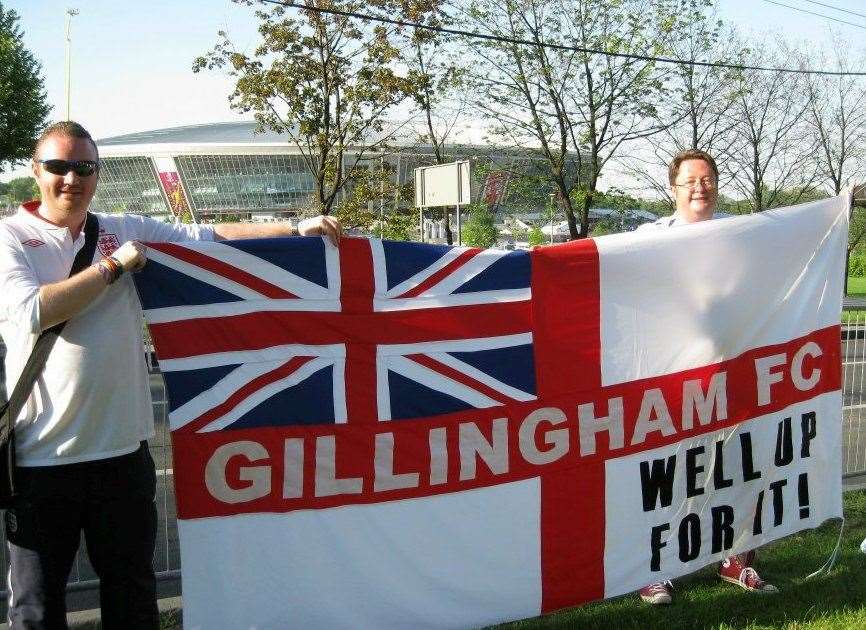 Eddie (right) has dedicated his life to following both the Three Lions and his beloved Gillingham FC. Picture: SWNS