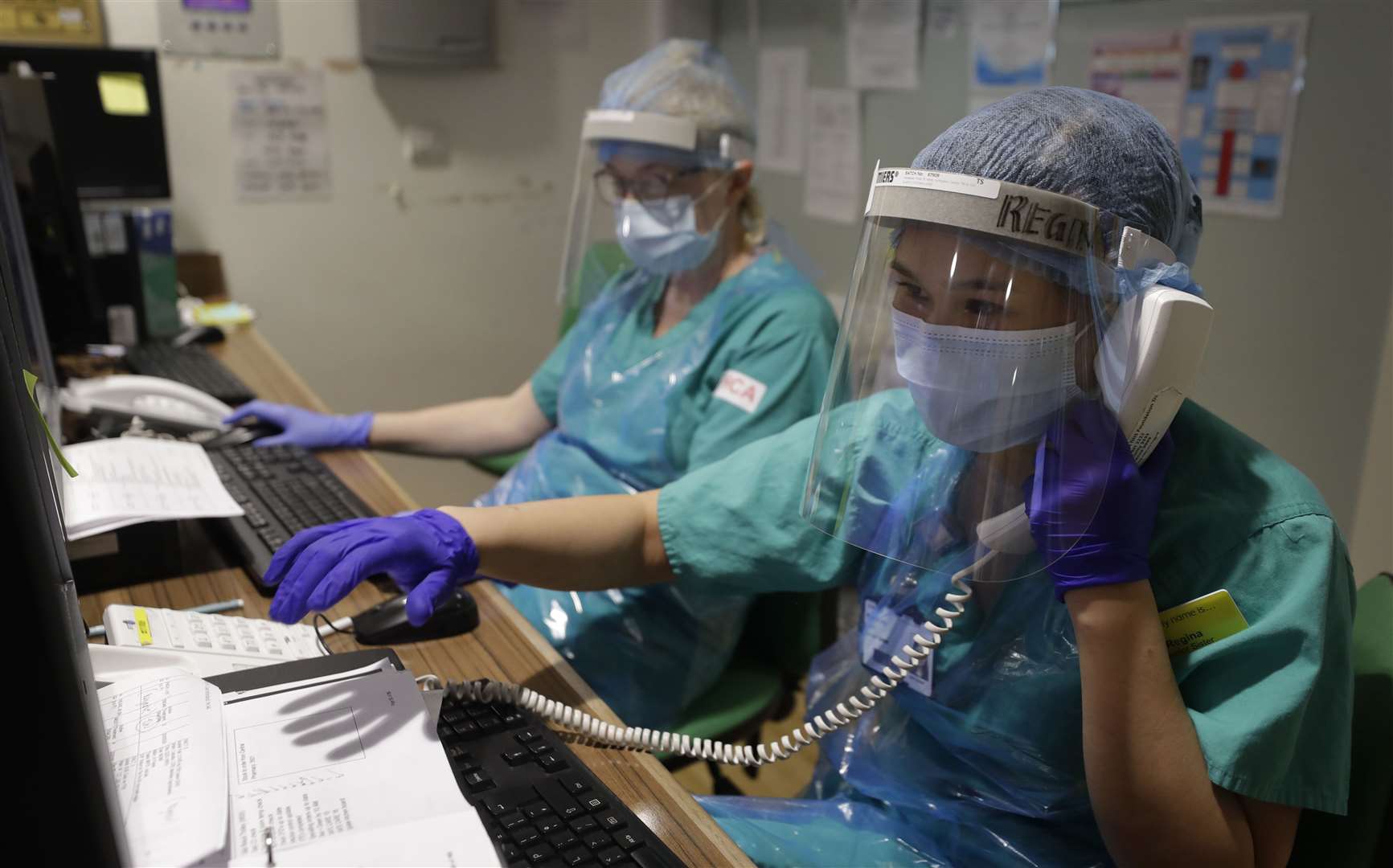 Nursing staff work on a ward at Addenbrooke’s hospital in Cambridge (Kirsty Wrigglesworth/PA)