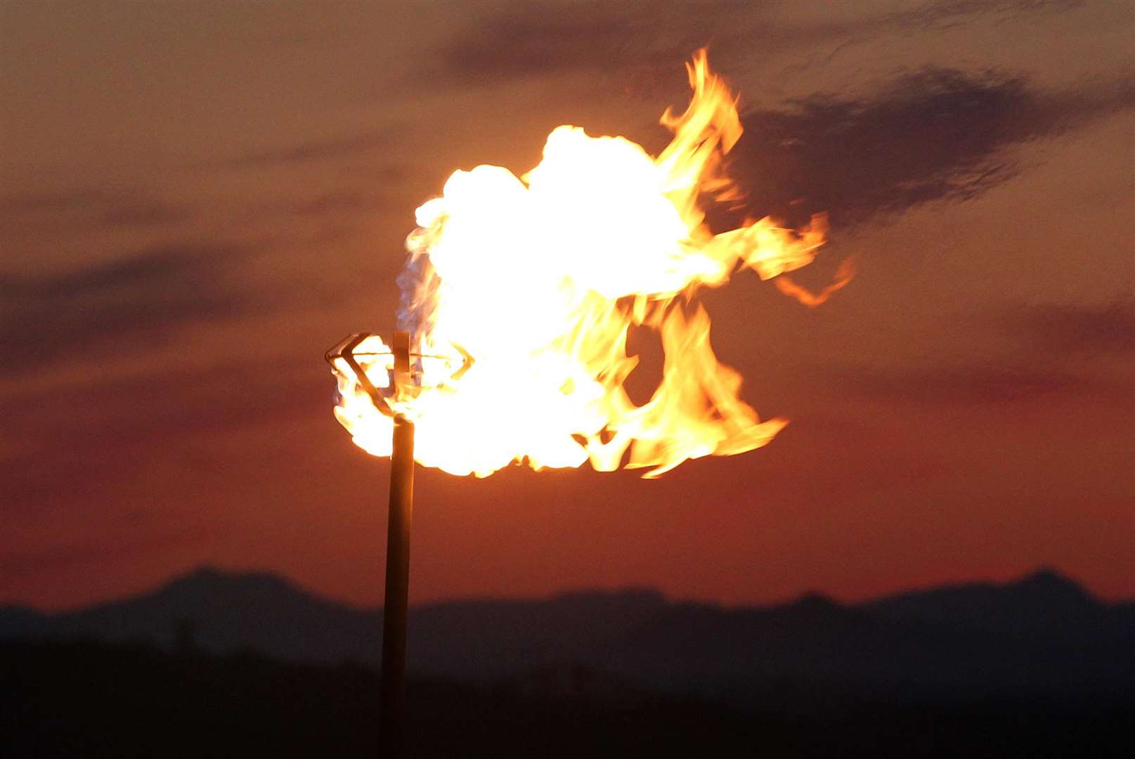 The Diamond Jubilee beacon burns at sunset at Edinburgh Castle in 2012 (Andrew Milligan/PA)