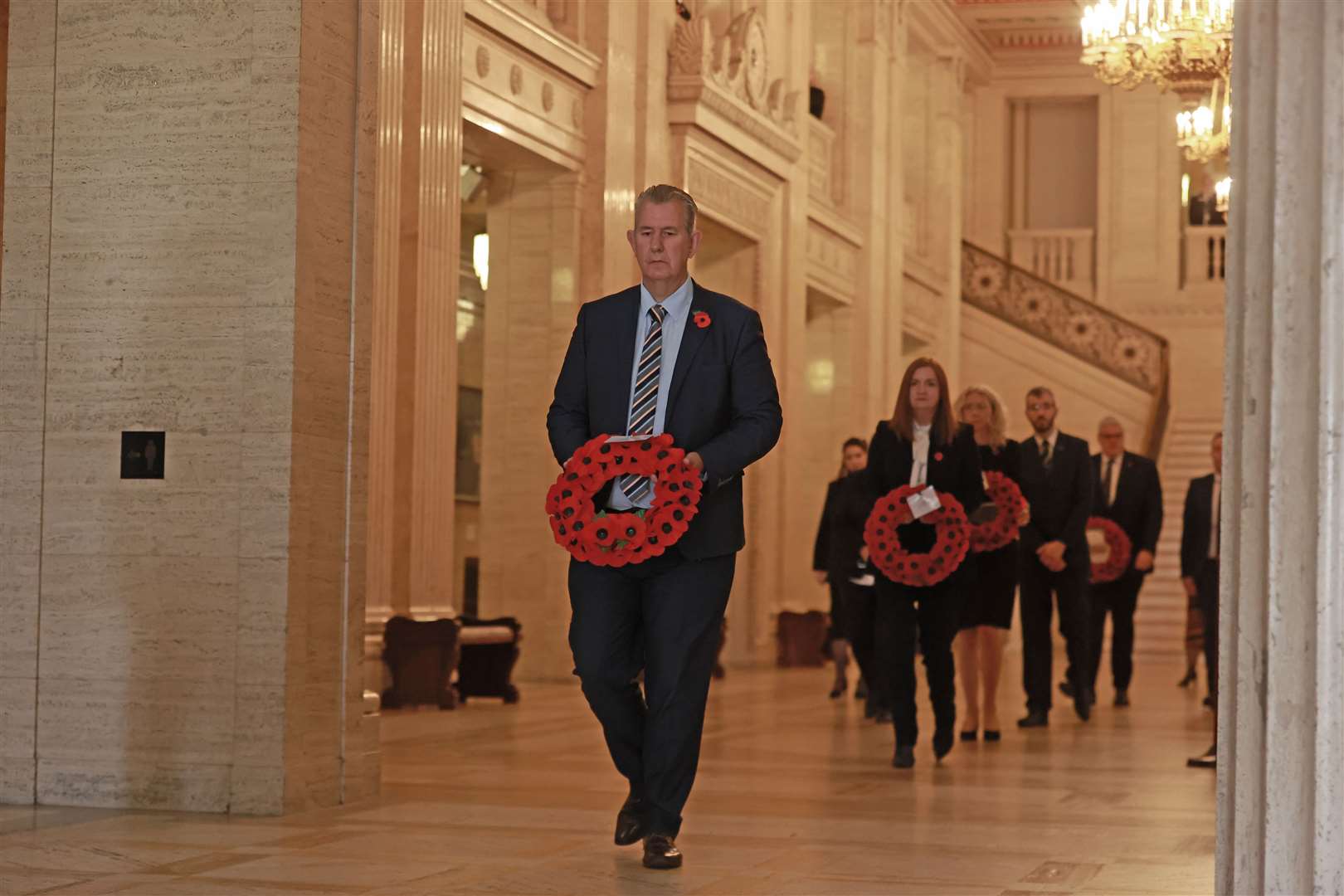 Edwin Poots, Speaker of the Northern Ireland Assembly, during a ceremony to mark Armistice Day at Parliament Buildings in Stormont (Liam McBurney/PA)