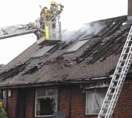 SCENE OF DEVASTATION Fire crews bringing the blaze under control. Picture: KM Group photographer BARRY CRAYFORD