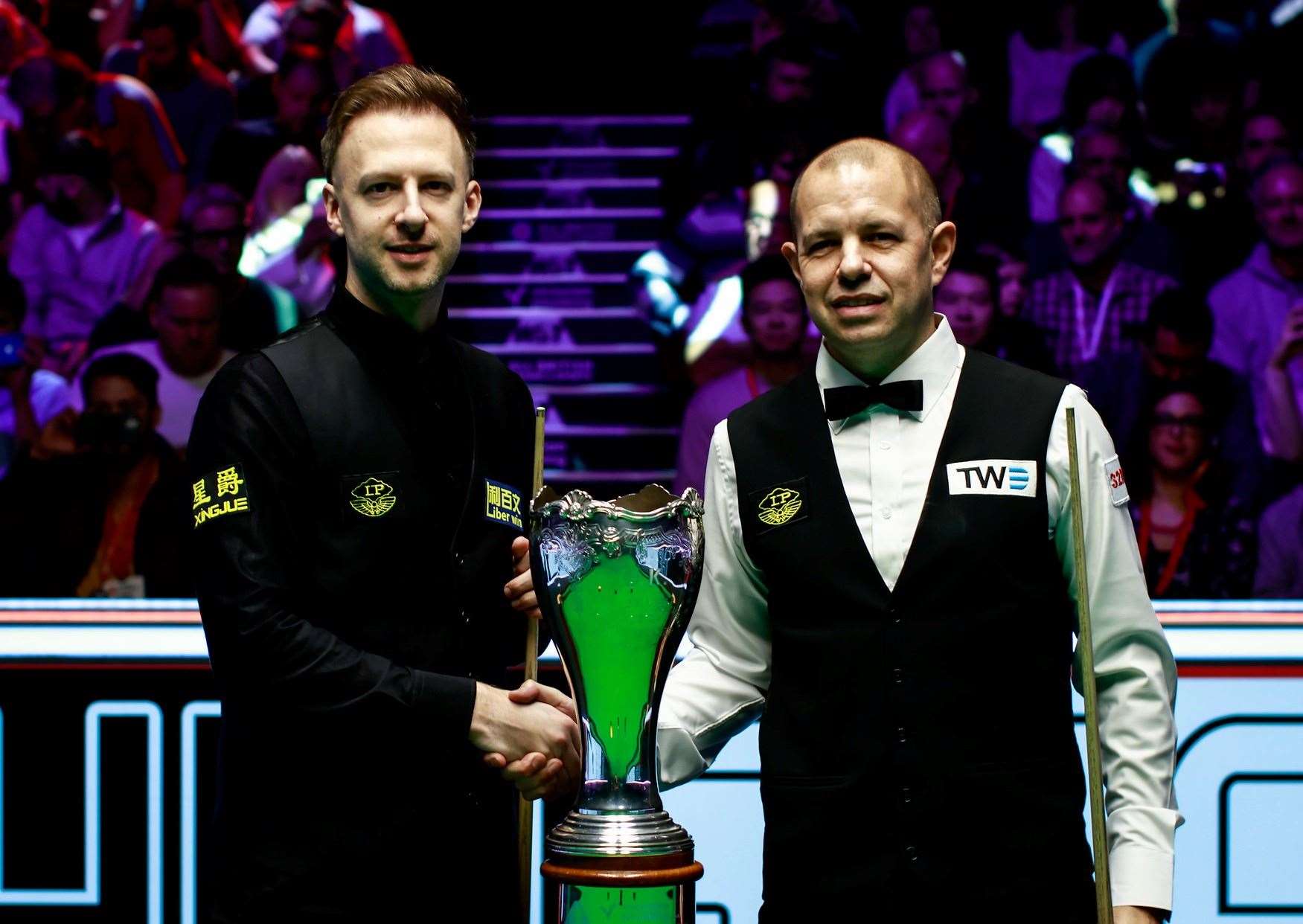 Ditton's Barry Hawkins, right, and Judd Trump shake hands before the UK Championship final at the York Barbican. Picture: World Snooker